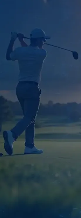 Golfer following through on a tee shot